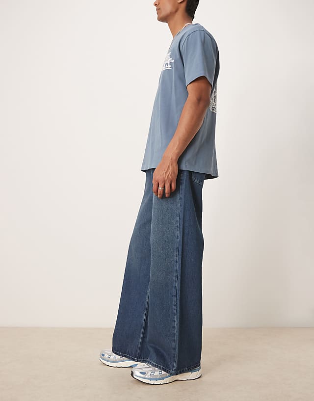 Asos ASOS DESIGN Super Baggy Jeans With Pleat Details In Indigo Wash
