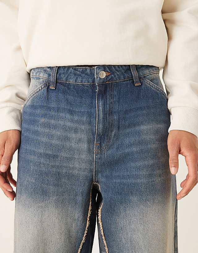 Asos ASOS DESIGN Super Baggy Jeans With Raw Edge In Washed Indigo