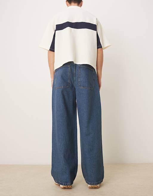 Asos ASOS DESIGN Super Baggy Jeans With Twisted Seams In Mid Wash Blue