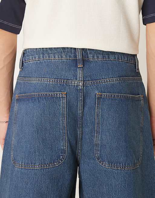 Asos ASOS DESIGN Super Baggy Jeans With Twisted Seams In Mid Wash Blue