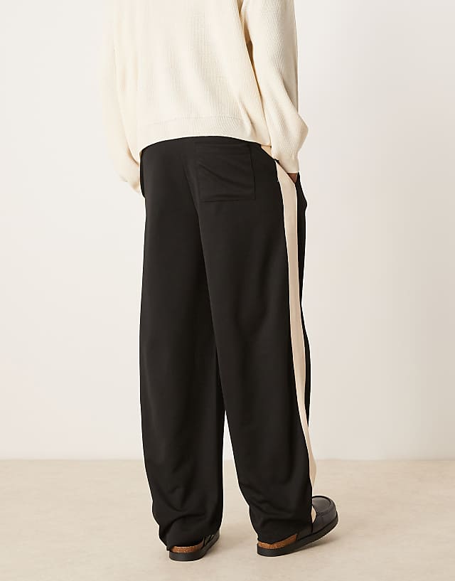 Asos ASOS DESIGN Super Baggy Jogger With Taping In Black