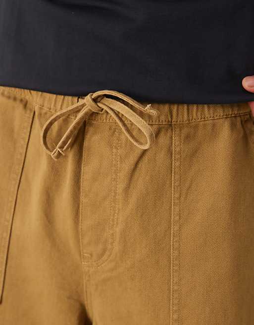 Asos ASOS DESIGN Super Baggy Pull On Fatigue Trouser With Darts In Tan