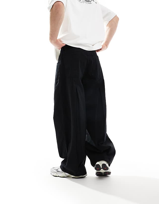 Asos ASOS DESIGN Super Baggy Trousers In Black With Pleat Detailing