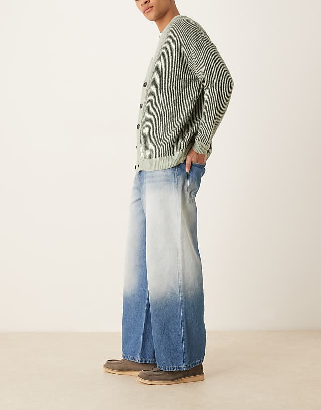 Asos ASOS DESIGN Super Baggy With Extreme Side Blasting In Mid Blue Wash