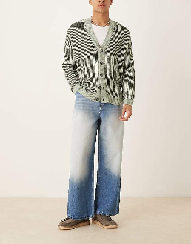 asos ASOS DESIGN super baggy with extreme side blasting in mid blue wash