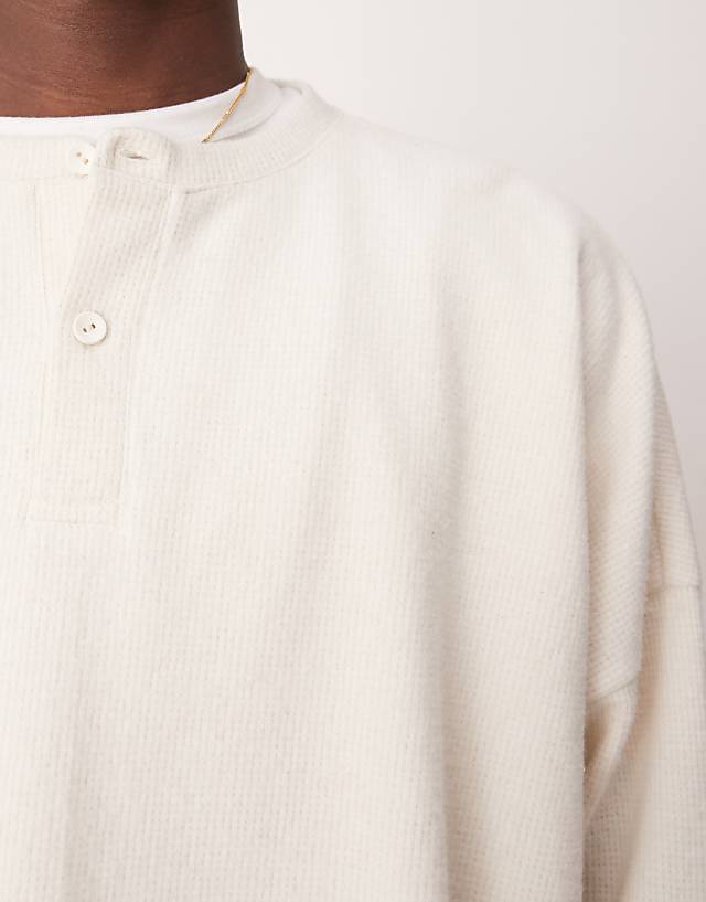 Asos ASOS DESIGN Super Oversized Cropped Long Sleeve T-shirt In Brushed Waffle With Henley Neck In Off White
