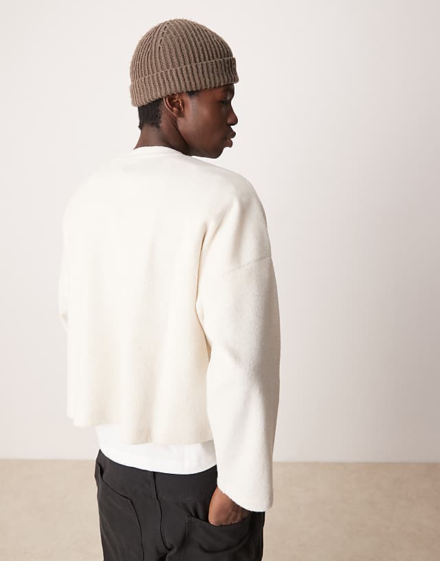 Asos ASOS DESIGN Super Oversized Cropped Long Sleeve T-shirt In Brushed Waffle With Henley Neck In Off White
