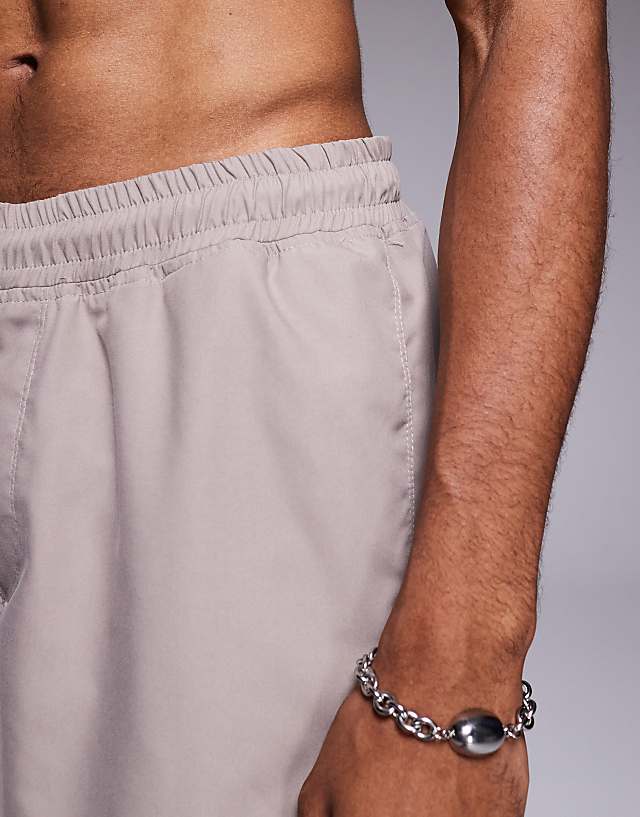 Asos ASOS DESIGN Swim Shorts In Long Length In Beige