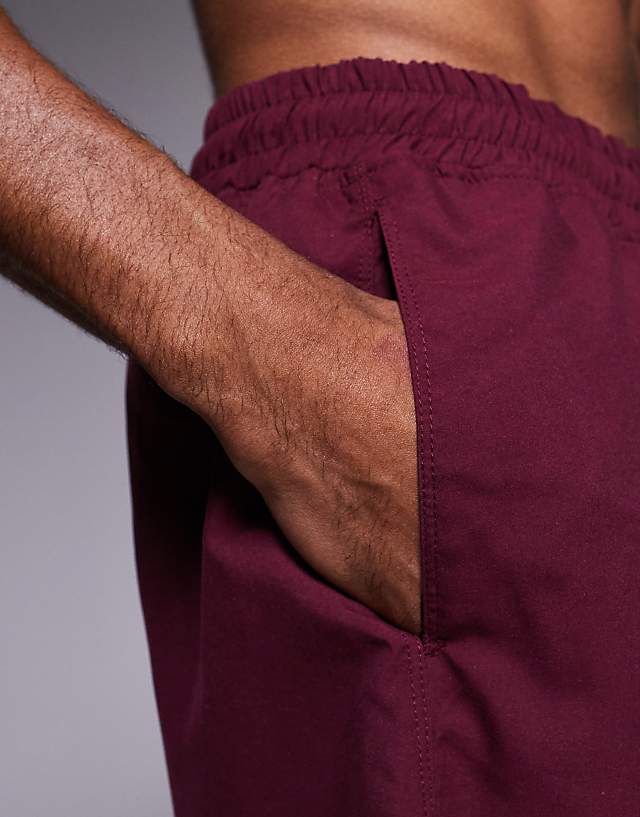 Asos ASOS DESIGN Swim Shorts In Long Length In Burgundy