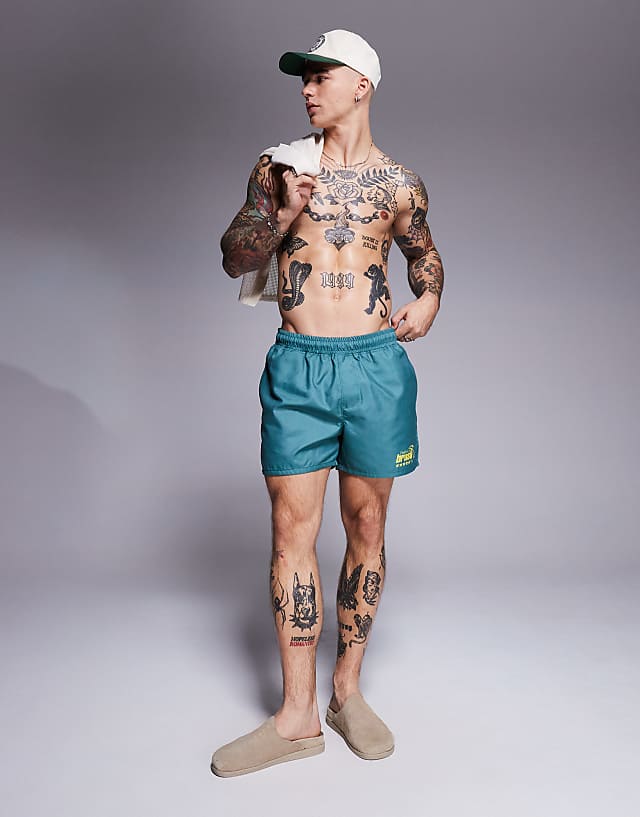 Asos ASOS DESIGN Swim Shorts In Short Length With Placement Print In Green