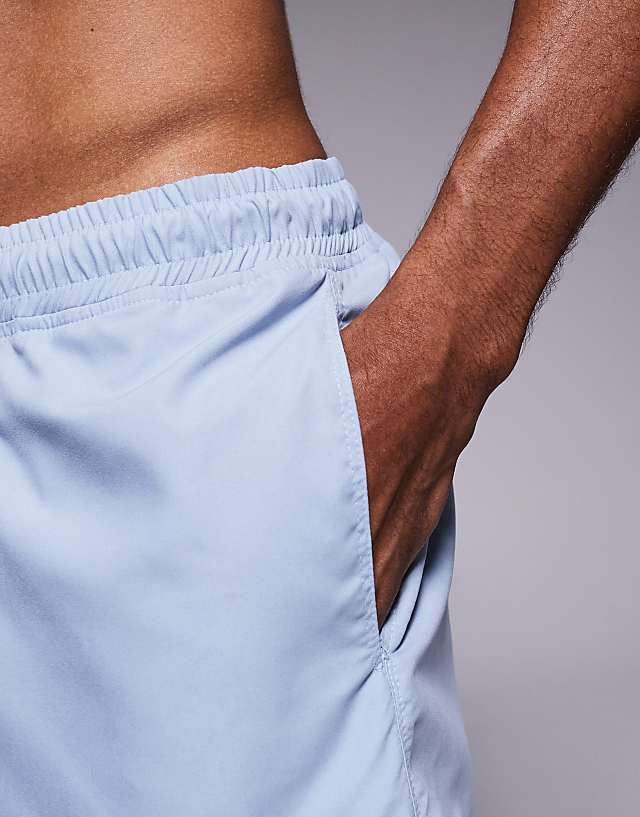 Asos ASOS DESIGN Swim Shorts In Super Short Length In Blue