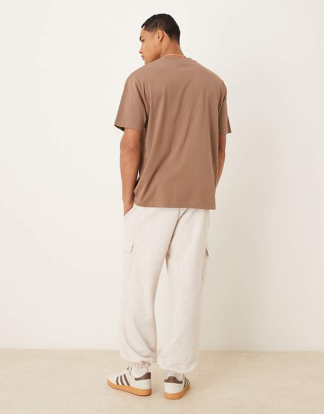 Asos ASOS DESIGN Tapered Fit Loopback Jogger With Cargo Pockets In Stone