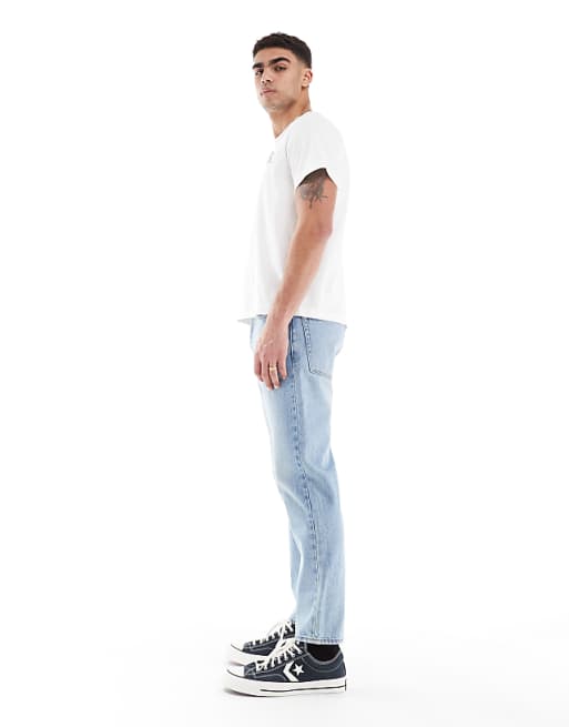 Asos ASOS DESIGN Tapered Jeans In Vintage Light Blue Wash