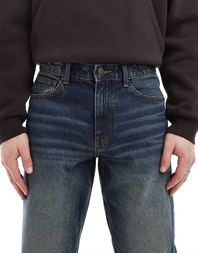 Asos ASOS DESIGN Tapered Jeans With Vintage Tint In Dark Wash Blue