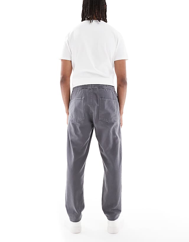 Asos ASOS DESIGN Tapered Pull On Chinos In Charcoal
