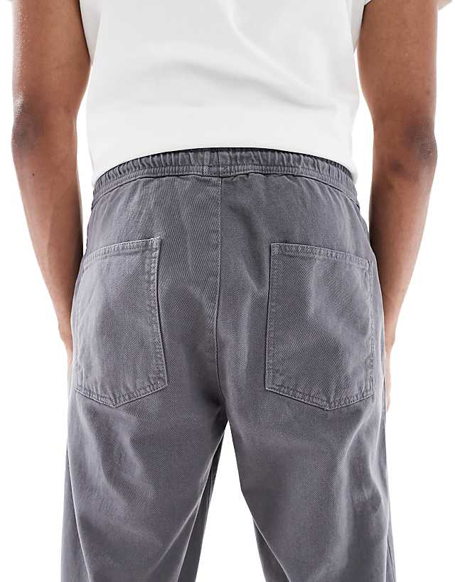 Asos ASOS DESIGN Tapered Pull On Chinos In Charcoal