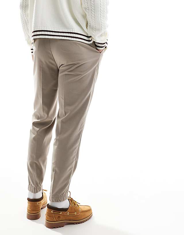 Asos ASOS DESIGN Tapered Smart Trousers With Jogger Cuff In Stone