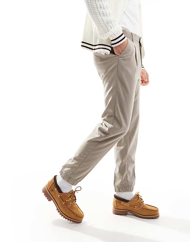 Asos ASOS DESIGN Tapered Smart Trousers With Jogger Cuff In Stone