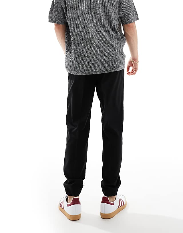 Asos ASOS DESIGN Tapered Smart Trousers With Jogger Cuff In Black