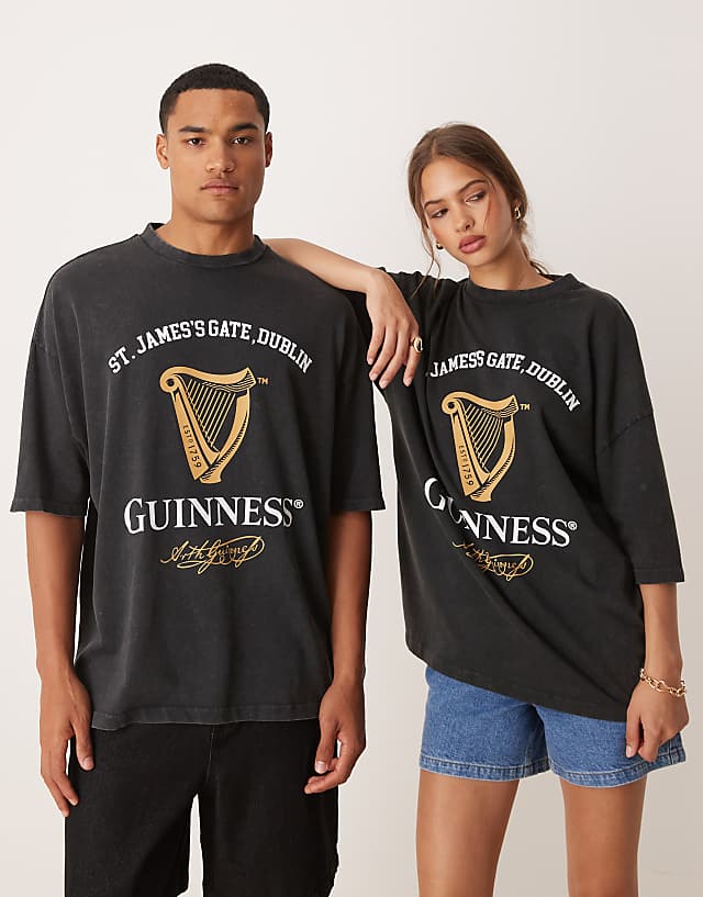 Asos ASOS DESIGN Unisex Oversized T-shirt With Guinness Prints In Washed Black