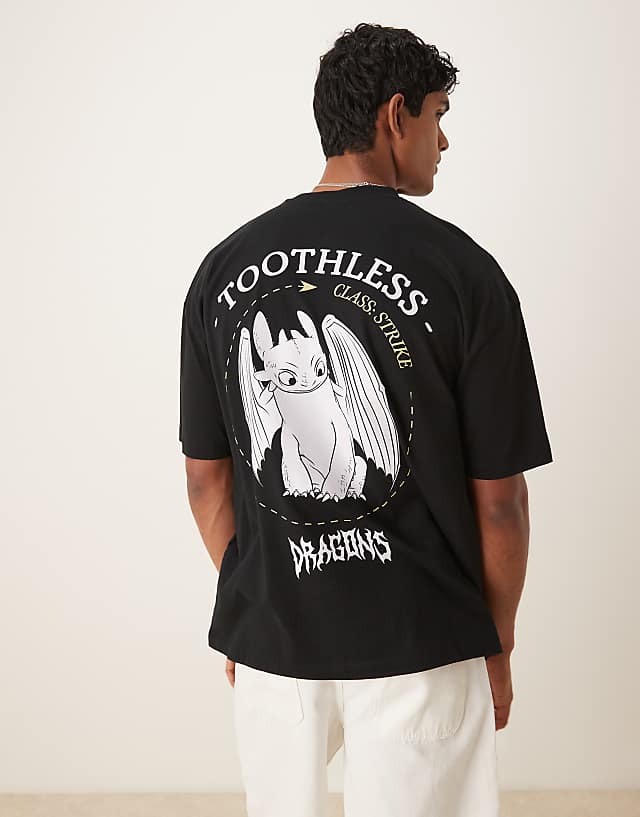 Asos ASOS DESIGN Unisex Oversized T-shirt With How To Train Your Dragon Toothless Prints In Black