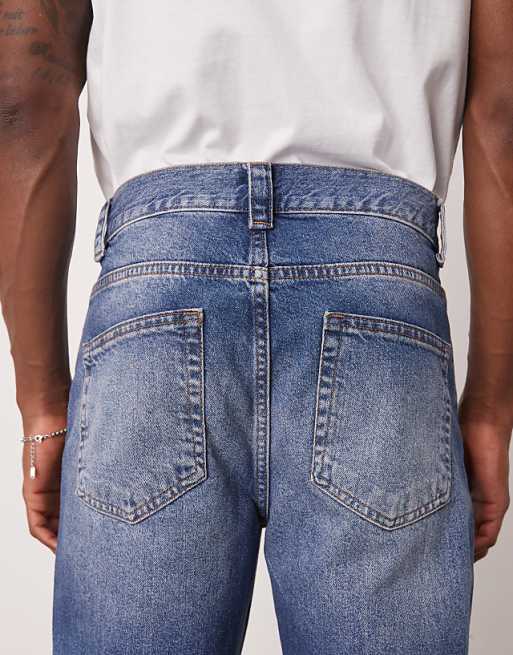 Asos ASOS DESIGN Wide Flare Jeans With Tint In Light Wash Blue