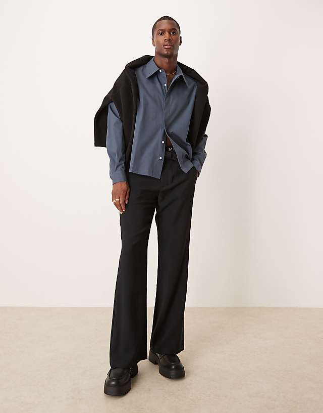 asos ASOS DESIGN wide flare smart trousers with belt in black