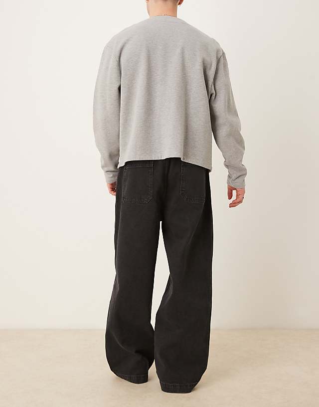 Asos ASOS DESIGN Wide Leg Jean With Self Tie & Pleat In Black Wash