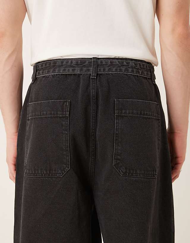 Asos ASOS DESIGN Wide Leg Jean With Self Tie & Pleat In Black Wash