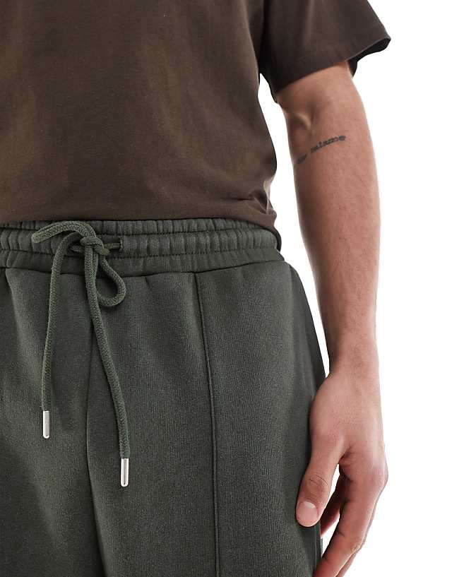 Asos ASOS DESIGN Wide Leg Jogger With Pocket Details In Washed Green