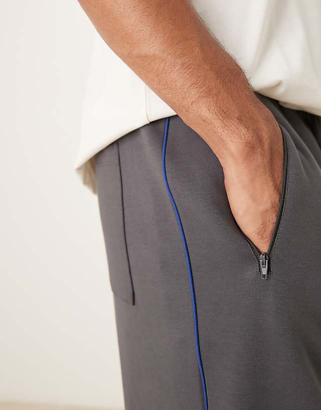 Asos ASOS DESIGN Wide Leg Jogger With Side Taping In Charcoal