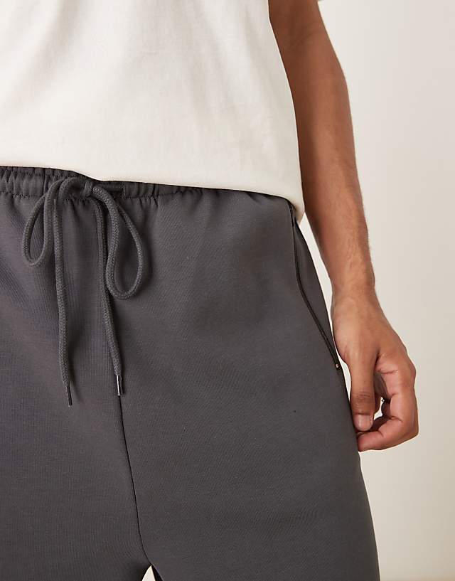 Asos ASOS DESIGN Wide Leg Jogger With Side Taping In Charcoal