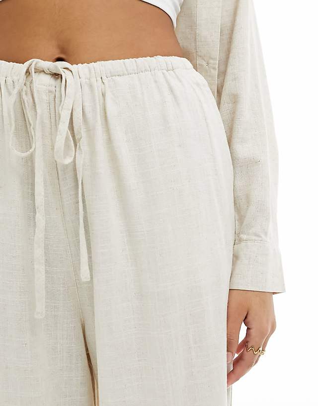 Asos ASOS DESIGN Wide Leg Pull On Trouser With Linen In Natural