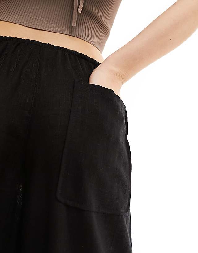 Asos ASOS DESIGN Wide Leg Pull On Trouser With Linen In Black