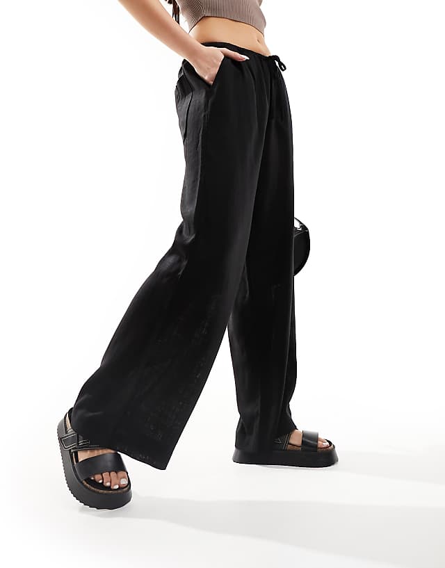 asos ASOS DESIGN wide leg pull on trouser with linen in black
