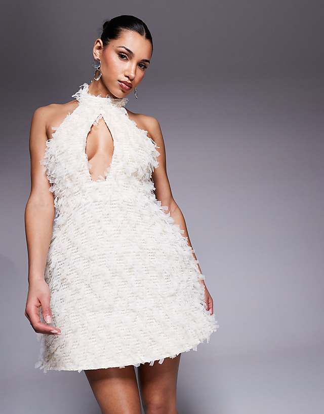 Asos ASOS LUXE Textured Halter Mini Dress With Bow Back In Cream