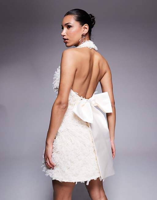 Asos ASOS LUXE Textured Halter Mini Dress With Bow Back In Cream