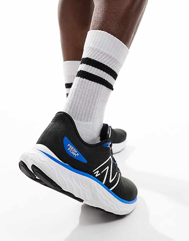 Asos New Balance Evoz Running Trainers In Blue