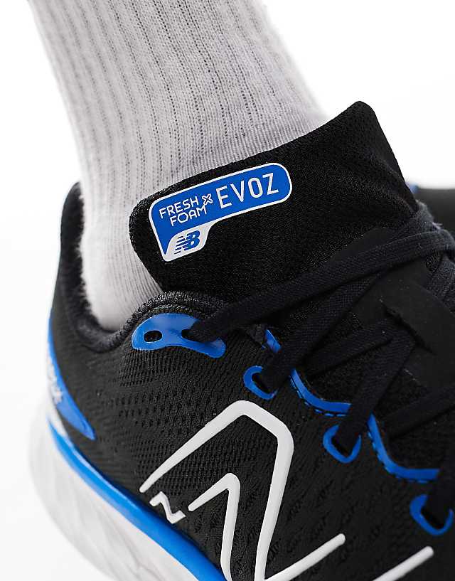 Asos New Balance Evoz Running Trainers In Blue