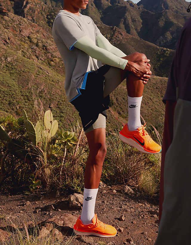 asos Nike Running Air Winflo 11 trainers in orange