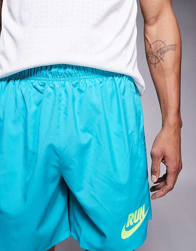 Asos Nike Running Challenger 7inch Shorts In Blue