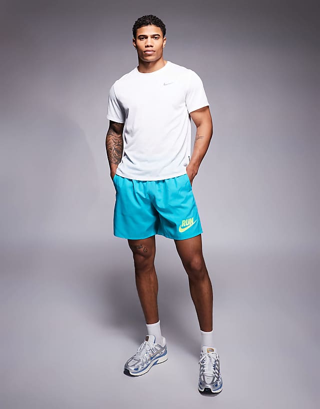 asos Nike Running Challenger 7inch shorts in blue