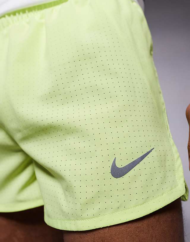 Asos Nike Running Dri-FIT 3 Inch Shorts In Yellow