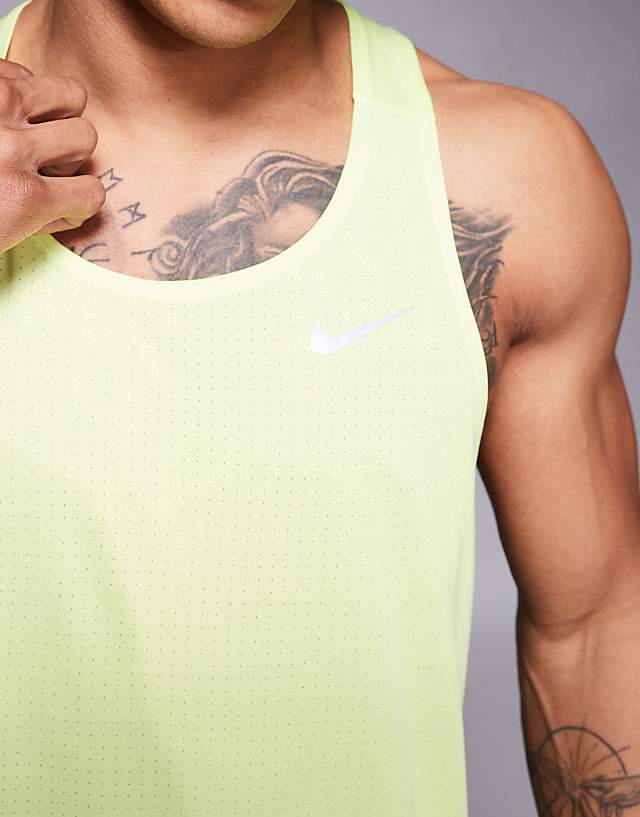 Asos Nike Running Fast Dri-FIT Vest In Yellow