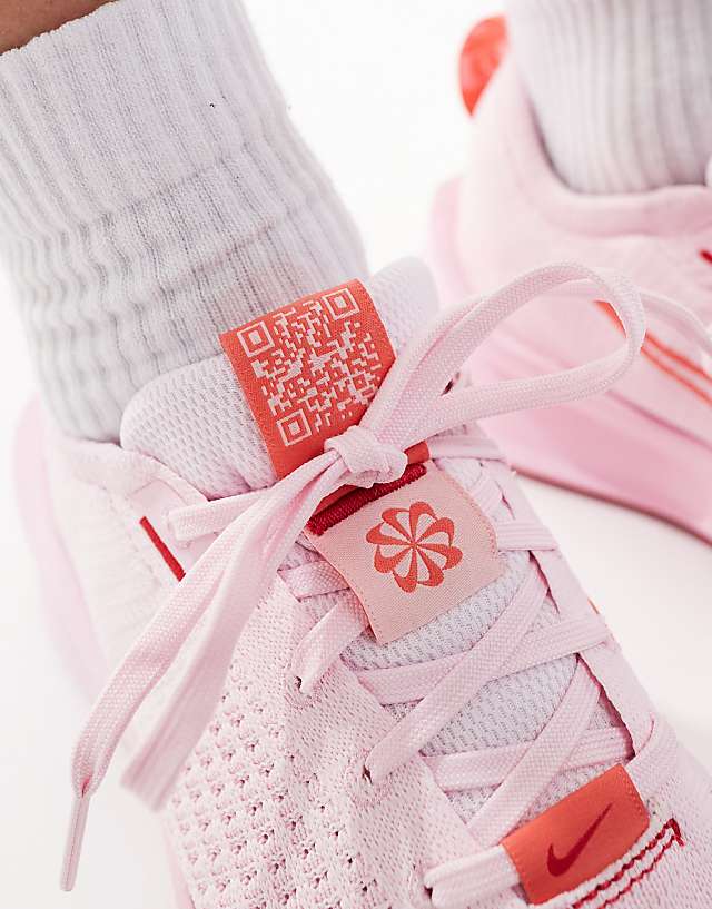 Asos Nike Running Interact Run SE Trainers In Pink