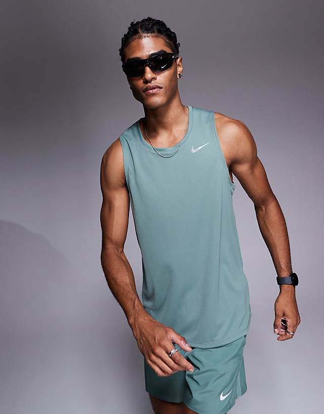 asos Nike Running Miler Dri-FIT vest in green