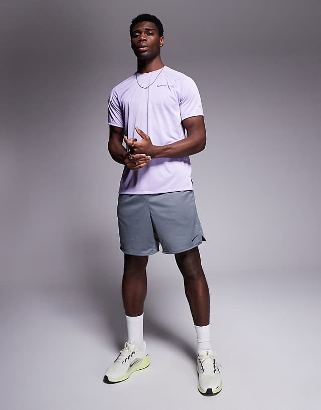 Asos Nike Running Stride Dri-FIT T-shirt In Lilac