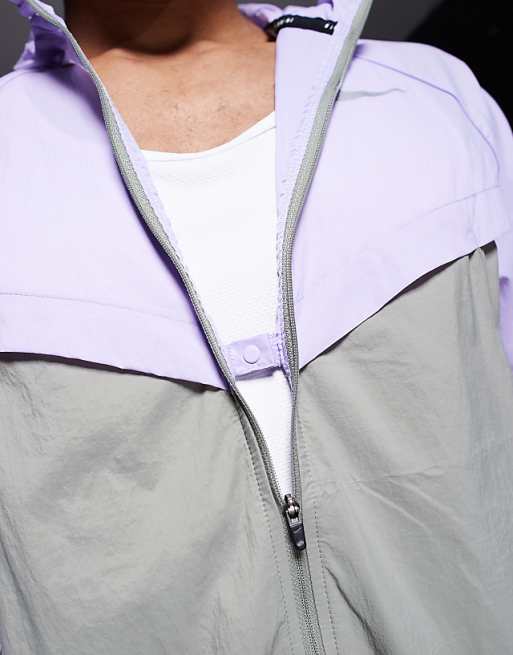 Asos Nike Running Stride Repel Jacket In Lilac