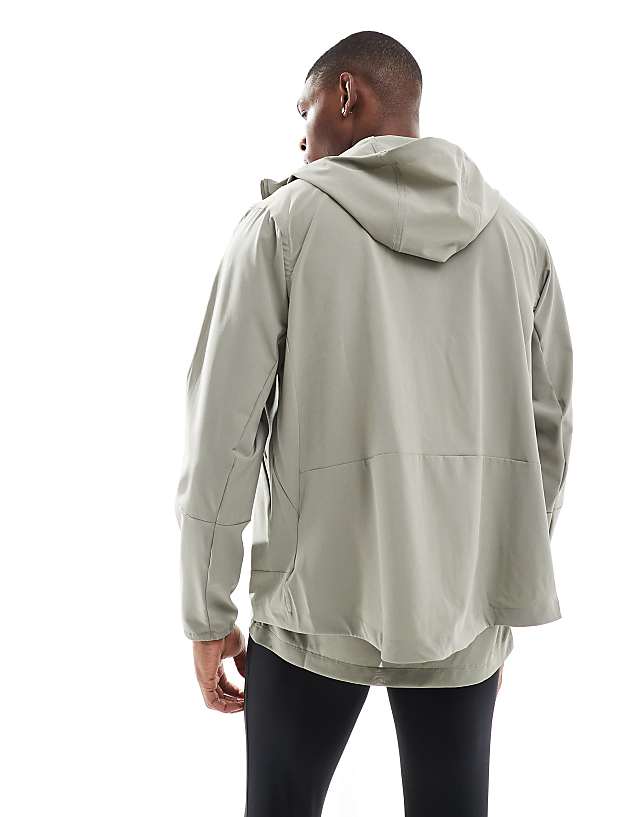 Asos Nike Training Dri-FIT Jacket In Light Khaki