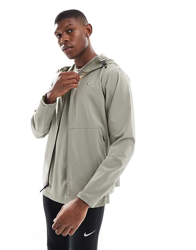 asos Nike Training Dri-FIT jacket in light khaki